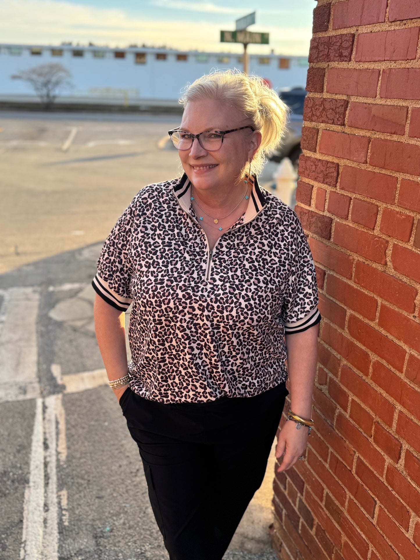 Leopard Half Zip Varsity Top