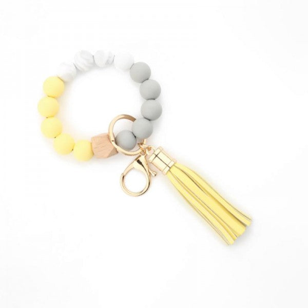 Soft Rubber & Wood Bead Keychain With Tassel Yellow