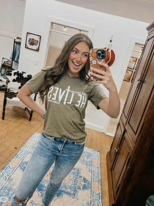 Plot Twist He Lives Tee